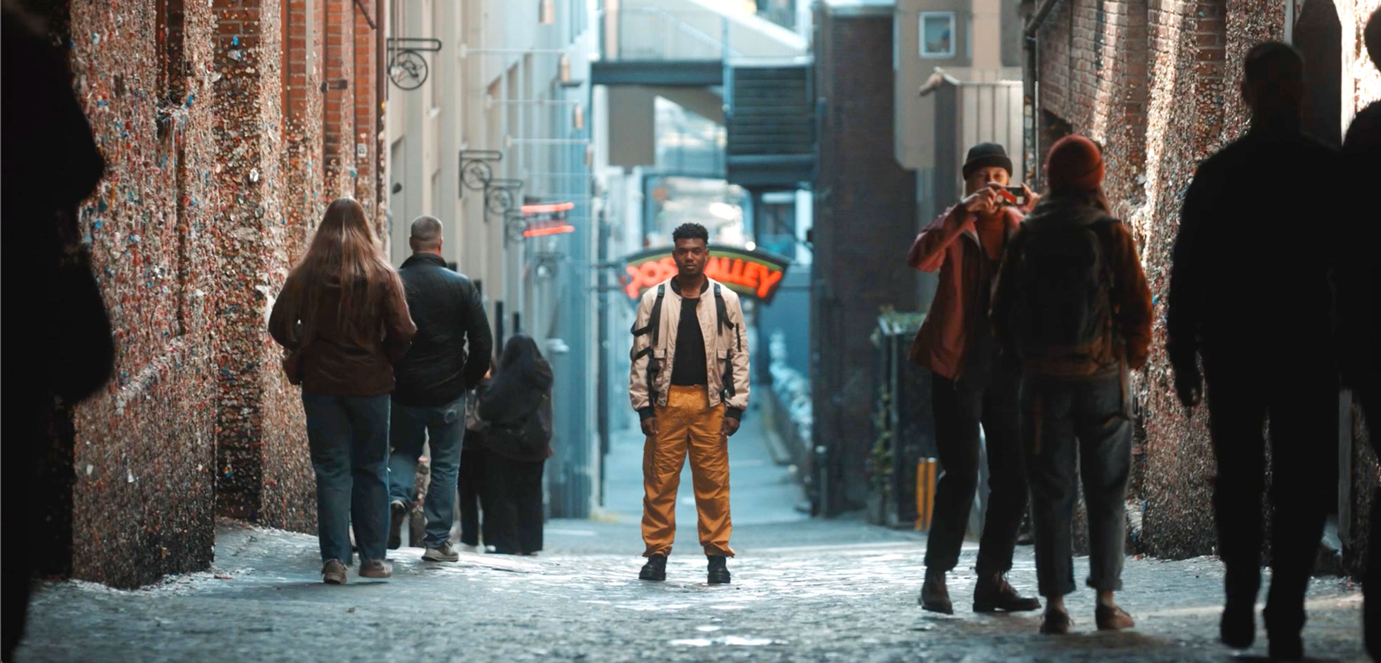 Singer Alto Moon in Post Alley in Seattle along the famous Gum Wall.