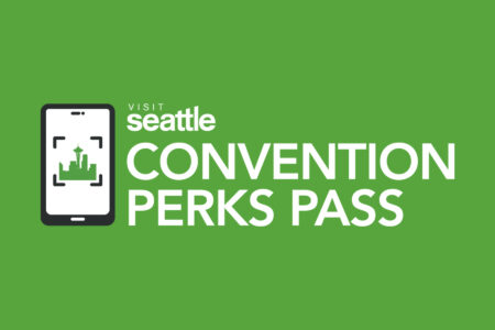 Green background featuring a smartphone icon with a city skyline inside. Text reads: 