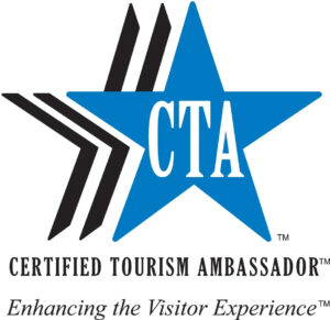 Certified Tourism Ambassador Logo with a blue star and black stripes featuring the letters "CTA" in white. Below, it reads "CERTIFIED TOURISM AMBASSADOR" and "Enhancing the Visitor Experience™" in black text.