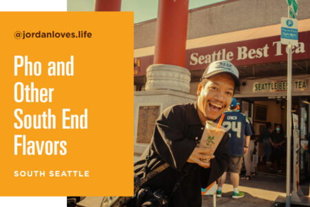 A person happily holding a drink stands in front of Seattle Best Tea, holding a camera. Text reads 