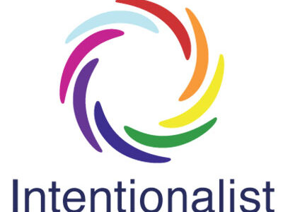 A circular logo made of colorful, interlocking crescents in blue, light blue, red, orange, yellow, and purple. Below the design, the word 