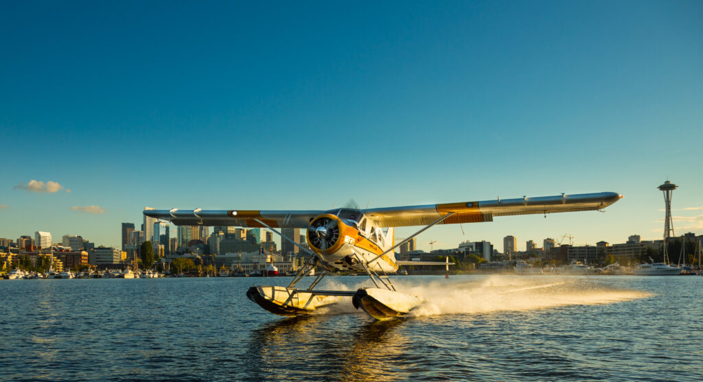 A Kenmore Air seaplane taking off for a tour.