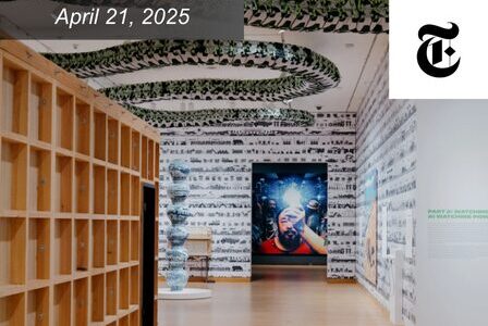 A modern art gallery with patterned walls and a snake made out of backpacks hangs above.