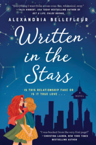 Book cover of "Written in the Stars" by Alexandria Bellefleur. Features two women embracing in front of a city skyline. The sky is deep blue with constellations. Text includes praise from authors Talia Hibbert and Christina Lauren.