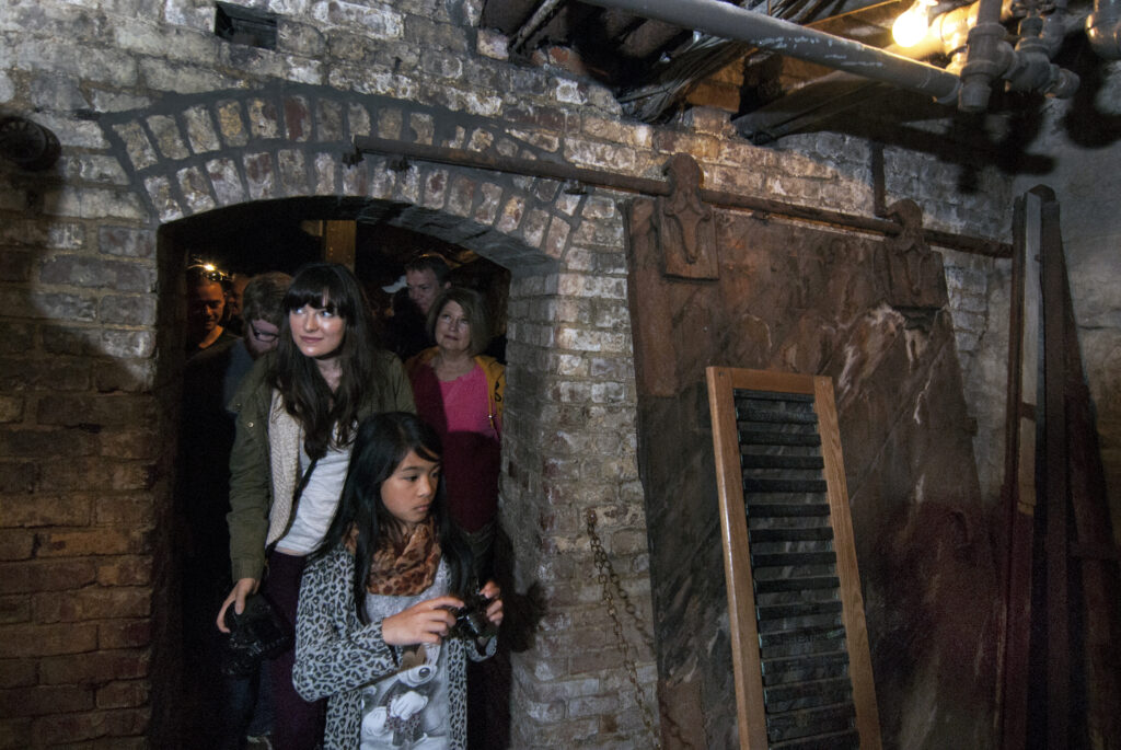 People touring Seattle's underground on Bill Speidel's Underground Tour