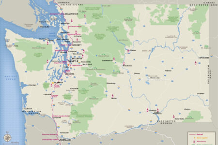 Map of Washington state, highlighting cities, national parks, and state routes. Seattle and Spokane are marked, with forests and mountains depicted. Railroads and geographical features like the Columbia River are also shown.