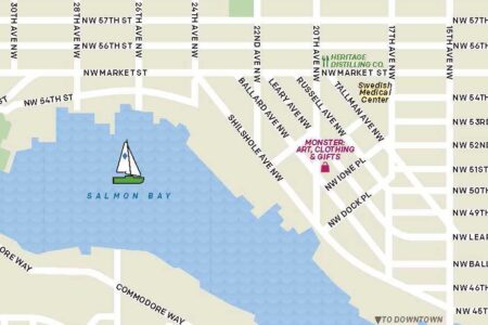 Map showing part of Seattle, featuring Salmon Bay with a sailboat illustration. Streets like NW Market St and 24th Ave NW are labeled. Nearby landmarks include Ballard Locks and Monster Art, Clothing & Gifts.