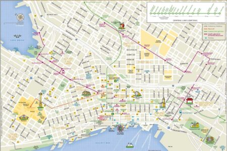 Map of Seattle's downtown area, showing landmarks, parks, transit routes, and pedestrian pathways. The map highlights key areas like Pike Place Market, Seattle Art Museum, and various neighborhoods with drawings and icons for easy navigation.